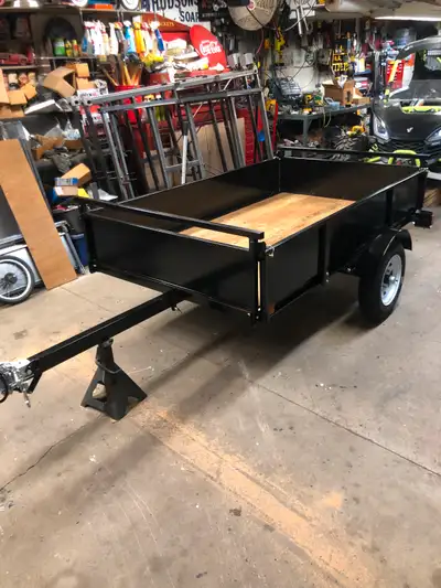 this is a 4'3" wide by 7ft long extends to 10 ft with gates down works great for tilt n load single...