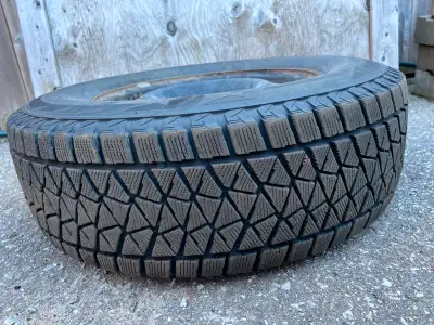 Offering Bridgestone Blizzak DM-V2 245/70R17 110S on Steel Rims. About ~7,000kms over 3 years on a 2...