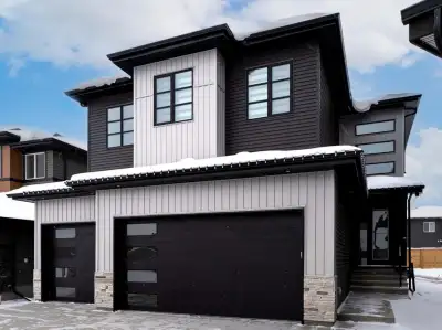 Amazing Value! Over 3,900 Sq Ft of Finished Space. One of the garage stalls has been thoughtfully co...