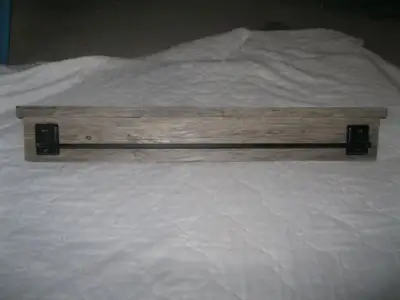 Handcrafted Towel Bar. Black towel bar, mounted on 100 year old barn board. The towel rack is 28 1/2...