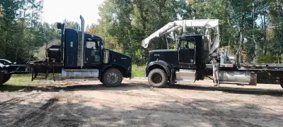 Trucks for hire winch tractor is a 53-ft scissor neck 10,000 picker truck with a 24-ft sliding and d...