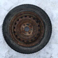 Michelin X-Ice 185/65R15 tires on 4 bolt steel rims