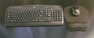 Wireless Logitech keyboard and mouse with ergonomic mouse pad, View more