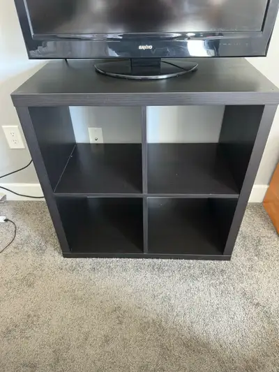 Selling my IKEA KALLAX shelf (black-brown) in great condition! Perfect for storage, display, or orga...