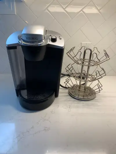 Large Keurig coffee maker plus 24 kpod holder. Keurig only used for 6 months and in excellent like-n...