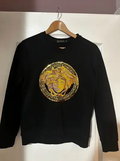 Versace sweater medium (fits small) In great condition (like new)