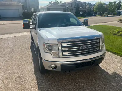 2013 Ford F150 Lariot 3.5L EcoBoost 202,000 km Heated seats, A/C seats, Tow Mirrors, Canopy, Sun Roo...