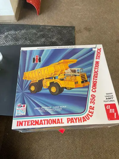 amt International payhauler 350 Construction truck Model kit. At Express Hobbies, we pride ourselves...