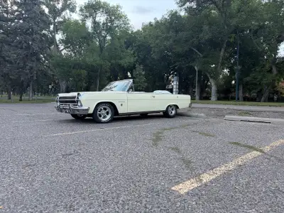 1965 AMC Rambler Ambassador 990. 327 3 speed automatic. Console bucket seats. Power top. Disc brake....