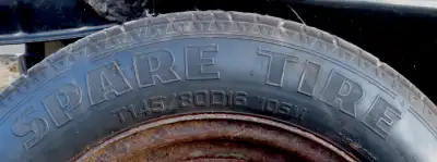 Spare Tire on Rim, still holds air fine. Barely used, mostly stored in the back of the truck. Rust i...