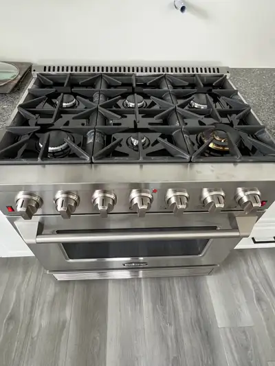 This is a 36” 6 burner natural gas range, never used. It had been discontinued, so you can’t get LP...