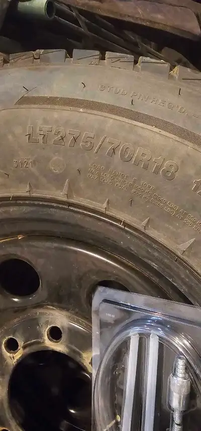 LT275/70R18 studded Venom Ice Hunter WT's, 6.5mm on 2 7.5mm on the other 2. Mounted and balanced on...