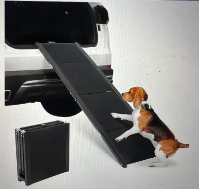 Dog ramp 62” long, 17” wide Holds up to 200lbs Brand New. Still in box