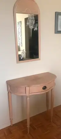 Hall side table with matching mirror. Table has a water stain.