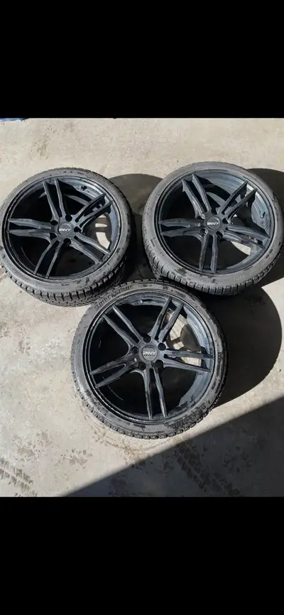 These practically new 3 Bridgestone Blizzak WS90 winter tires paired with sleek Envy Wheels are read...