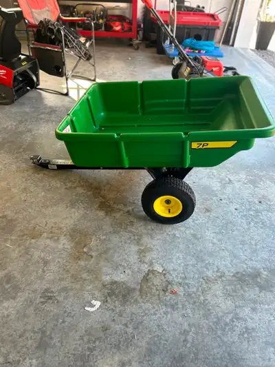 John Deere 7P utility trailer with tilt, Hardly used 5 yrs old. Was used with our E120 John Deere wh...