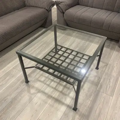 The perfect place to set down a spread of snacks, magazines and more. The black metal frame contrast...