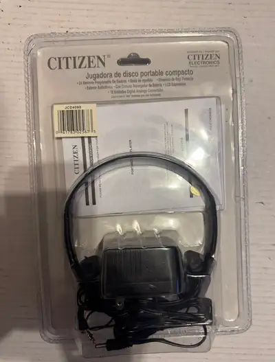 Relive the nostalgia with this new in-package Citizen Portable Compact Disc Player, model JCD4090, a...