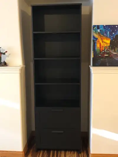 Black ikea brimnes shelving unit/bookshelf. In new condition. No delivery. 2 drawers and multiple ad...