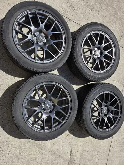 Selling a set of four Michelin X-Ice winter tires, size 225/50R17. They are mounted on Hyundai rims....