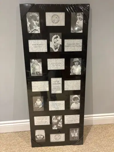 Showcase your cherished memories with this new multi-photo collage frame, designed to hold a variety...