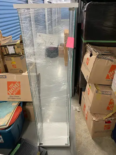 I have for sale 4 glass display cabinets with matching glass shelves for each in prestine condition....