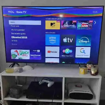 TCL Roku TV 4K ultra HD resolution + TV stand, View more