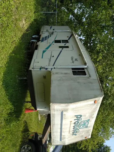 2001 Prowler 5th wheel trailer. The roof does need work and a new vent. The fridge works, not sure a...