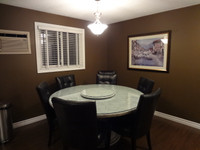 One of a kind granite dining table and eight chairs