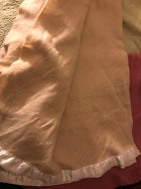 Cream coloured twin wool blanket