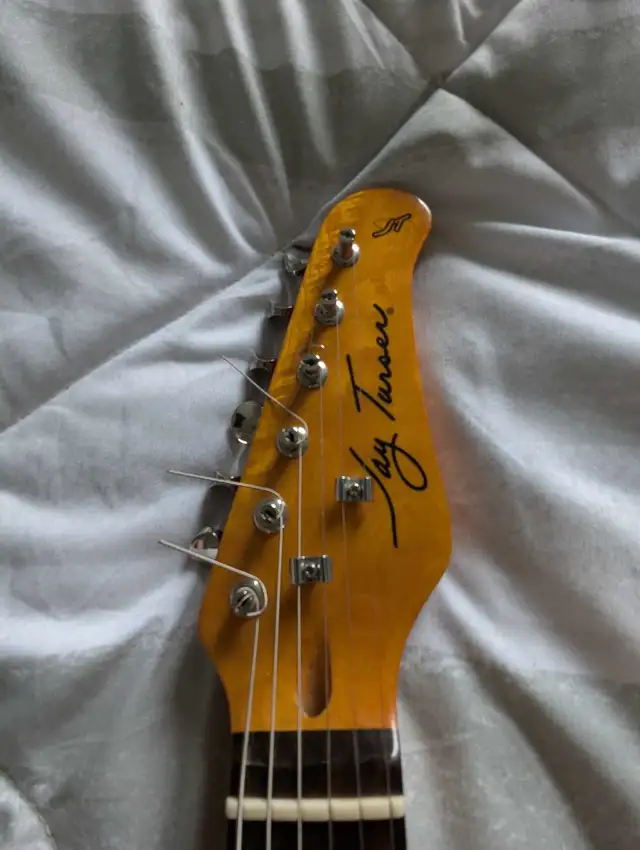 Jay Turser Stratocaster with strap62864362942083123