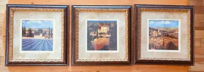 Bought at Linens & Things a set of 3 different prints in autumn colors showing rolling country field...