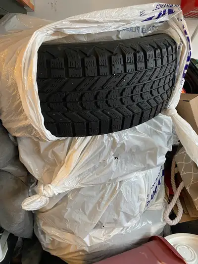 Winterforce winter tires, size 205/55R16 91S, offering reliable traction in snowy and icy conditions...