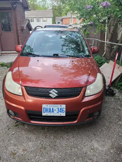 2008 suzuki sx4 AWD Needs a driveshaft due to U- joints being worn out, Has a engine light on for kn...