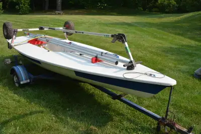 Race equipped Laser, dolly, top cover, Fogh board and rudder bag. 3 good sails. Hull watertight. Exc...