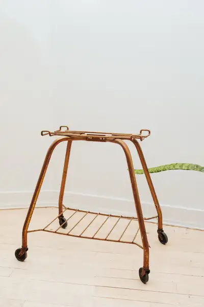 A small-scale piece with big presence. Warm, aged metal with a naturally worn patina — the kind of t...