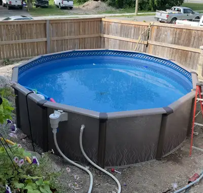 I have an 18 round above ground swimming pool brand new in the boxes comes with everything you need...
