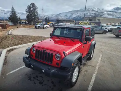 2011 Jeep wrangler JK Very low kilometers (60,000km) Color: Flame Red Model: Sport Hard top Light ba...