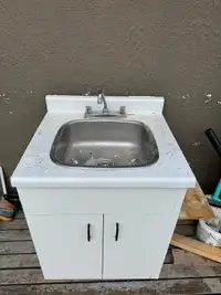 Cabinet with sink and faucet 