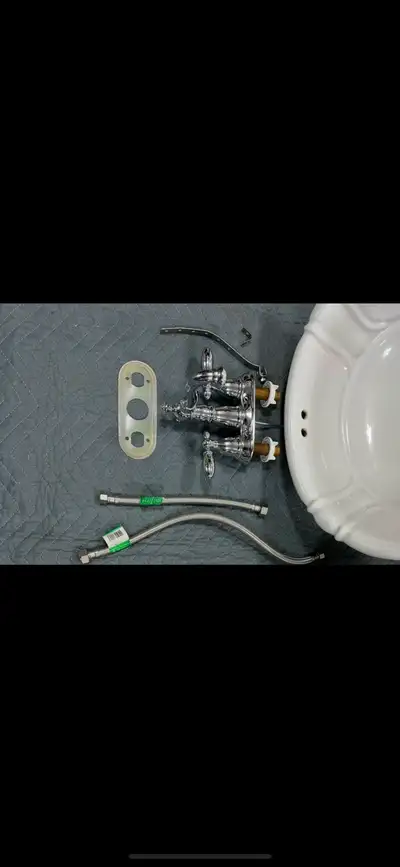 bathroom porcelain sink and taps. reduced, View more
