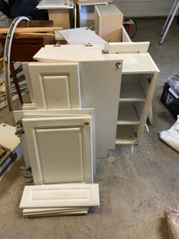 White wooden kitchen cabinets with bronze handles - $1,000