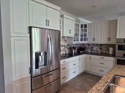 Antique White kitchen w/granite tops in good condition. Renovating and enlarging kitchen so no longe...