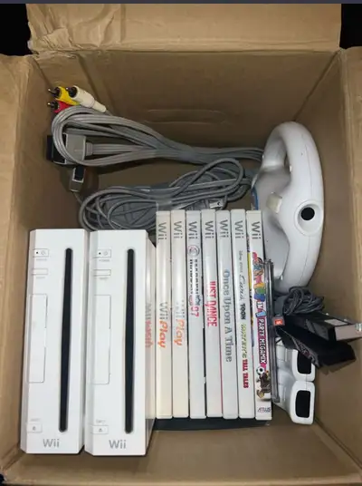 Selling this box of wiis games controllers hook ups etc. price is $120 FIRM picked up in Lockport/se...