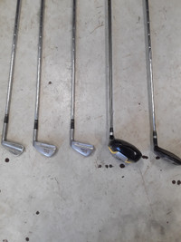 An assortment of golf clubs
