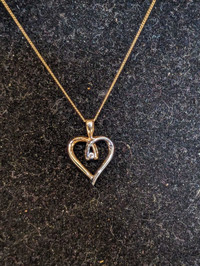 Heart shaped half and half diamond pendant 