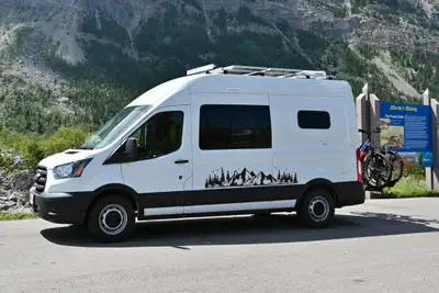 Van conversion with low kilometers for sale. We travelled across Canada in the van and averaged 14.5...