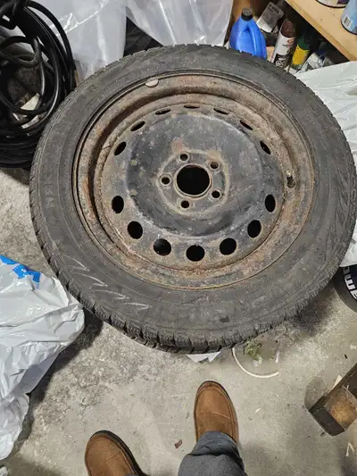 Set of 4- 16" 5 bolt 100mm rims. two with tires on ( tires are no good) 2 rims with no tires on.