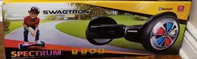 Swagtron hoverboard in box. Look at pictures and other ads.