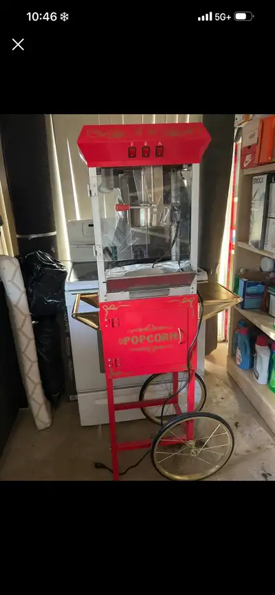 Get ready to bring the carnival home with this red popcorn machine! It's in used condition and ready...