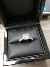 Custom engagement ring featuring a full 1.0 carat cushion cut 